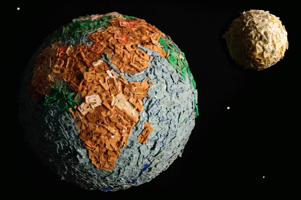 An image of the earth made out of melted bread tags