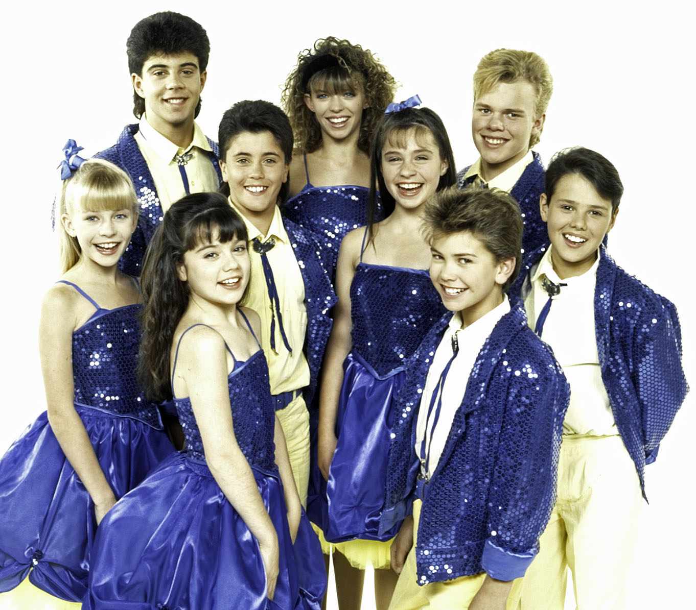 Members of the Young Talent Team wearing blue outfits.