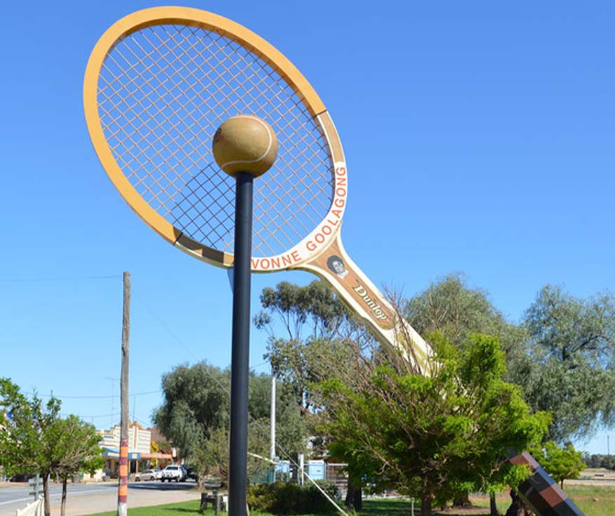 A giant tennis racquet and ball at Barellan in honour of Evonne Goolagong
