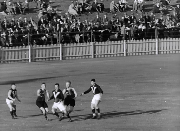 In a 1933 AFL match between Victoria and South Australia, Gordon Coventry scores a goal