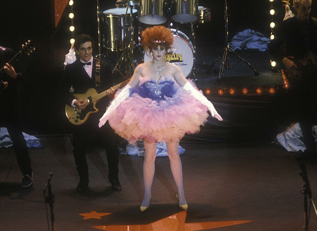 Jo Kennedy in Starstruck performing on stage wearing pink sequined tutu