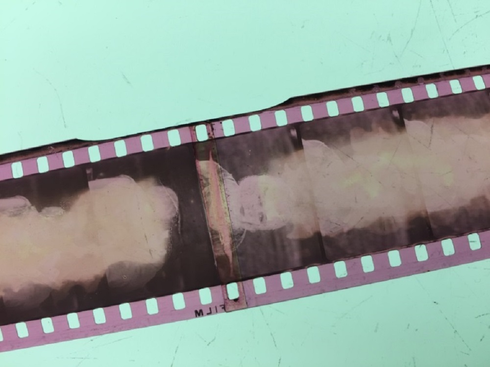 Strip of 35mm nitrate film showing decomposition