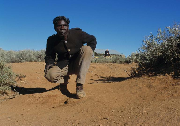 David Gulpilil searches for the escaped girls in a still from the film Rabbit-Proof Fence.