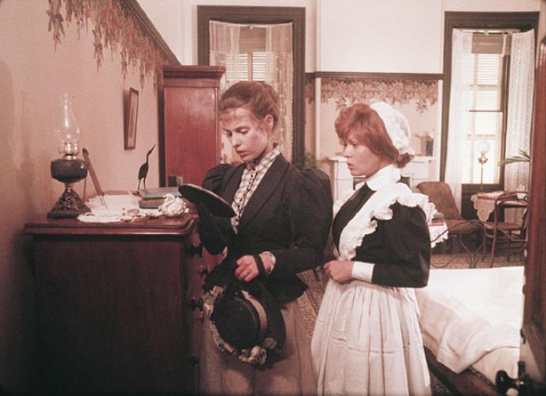 Minnie the maid helps the French mistress search Miranda's room in a scene cut from Picnic at Hanging Rock.