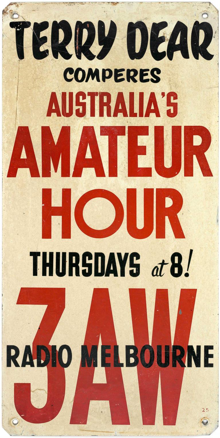 Metal advertising sign with black and red text on white background. Text reads:' Terry Dear comperes Australian Amateur Hour Thursdays at 8! 3AW Melbourne'.