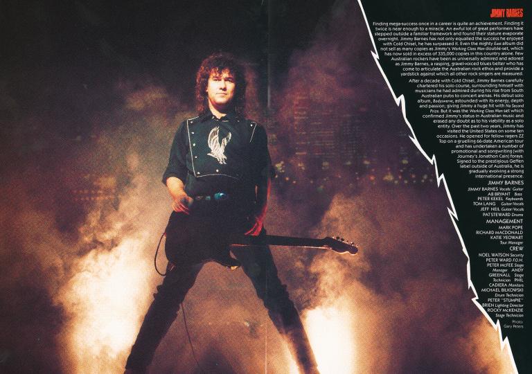 Full length shot of Jimmy Barnes dressed in black holding a guitar and staring down towards camera in a wide stance, against a dark background with fire and smoke behind him. On the right is some white text outlining Barnes' biography.