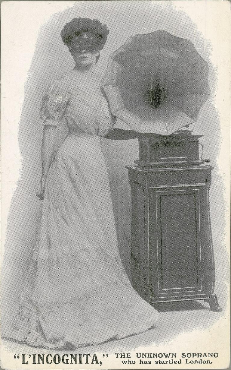 A masked woman stands next to a gramphone. The text reads, 'L’Incognita, the unknown soprano who has startled London'. 