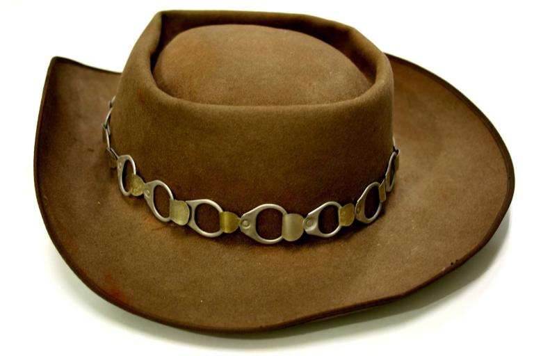 A brown Akubra hat with a beer-can ringpull hat band worn in the film Wake in Fright