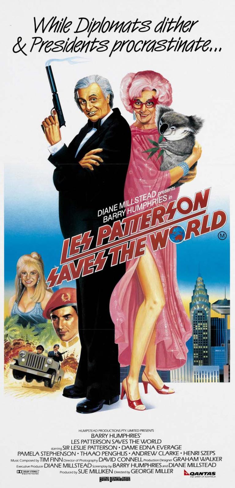 Daybill poster for Les Patterson Saves the World depicting an illustration of Sir Les Patterson in a tuxedo holding a smoking gun and Dame Edna Everage holding a koala with a lot of leg showing in her pink dress.