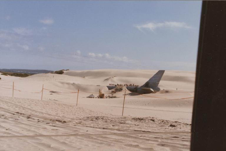 Desert with crashed airplane