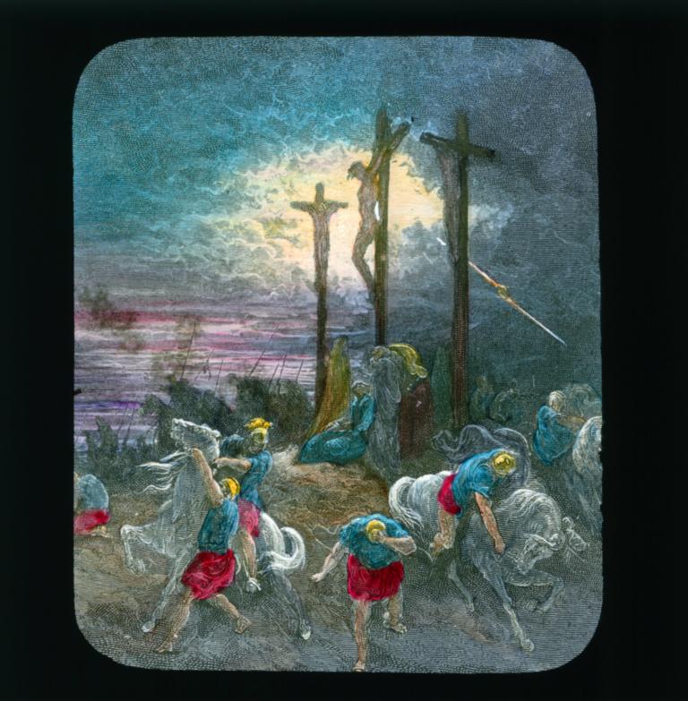 Christ and others hang on crosses under a darkening sky