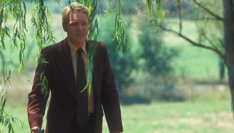 George Mallaby wearing a brown suit in Homicide