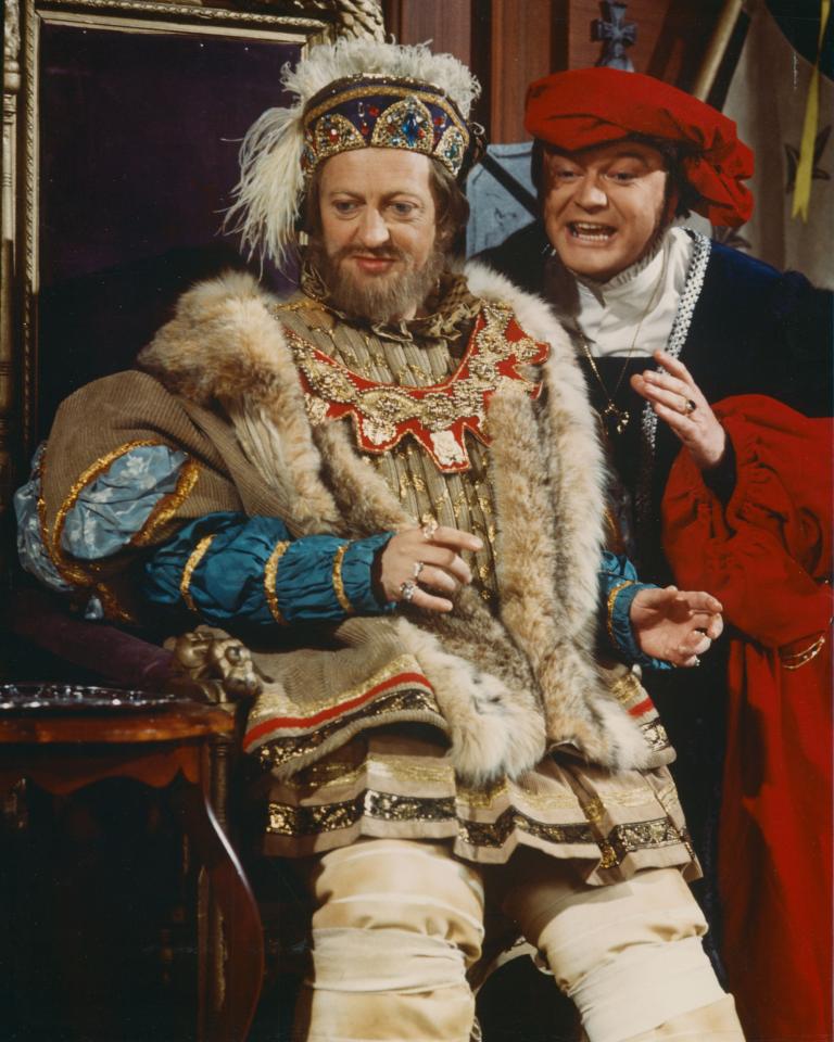 Graham Kennedy sitting on the throne as Henry VIII with Bert Newton standing beside him