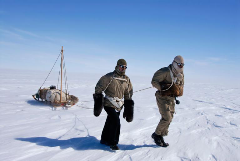 Tim Jarvis and John Stoukala pulling a sledge during filming