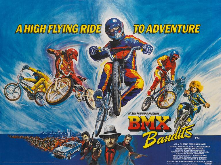 Poster for the film BMX Bandits showing four cyclists jumping through the air on BMX bikes. The film title is in the bottom right and writing at the top reads "A high flying ride to adventure".
