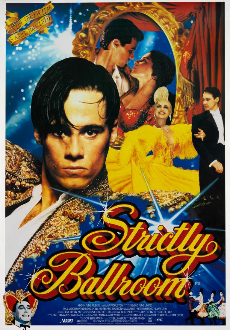 Strictly Ballroom movie poster featuring large head and shoulders image of Paul Mercurio in gold bolero jacket, and other characters in the background. The movie title is written in a large red and yellow cursive font.