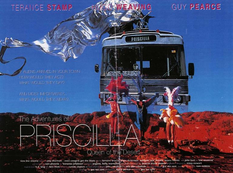 Image of bus travelling in desert setting with a drag queen riding on top dressed in a silver, flowing costume. Image is bordered by two drag queens dressed in silver sequined costumes and headresses.