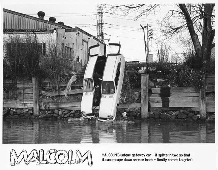 The two halves of Malcolm's getaway car plunge into a river