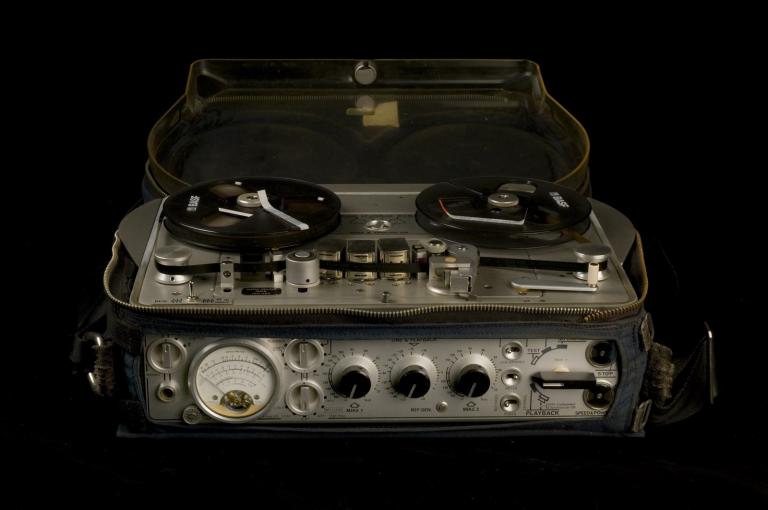 Nagra portable sound recorder in blue carry bag