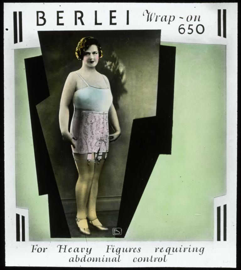 A Berlei glass slide advertisement for the Wrap-on 650 foundation garment showing a model wearing it. The text says: 'For heavy figures requiring abdominal control'.