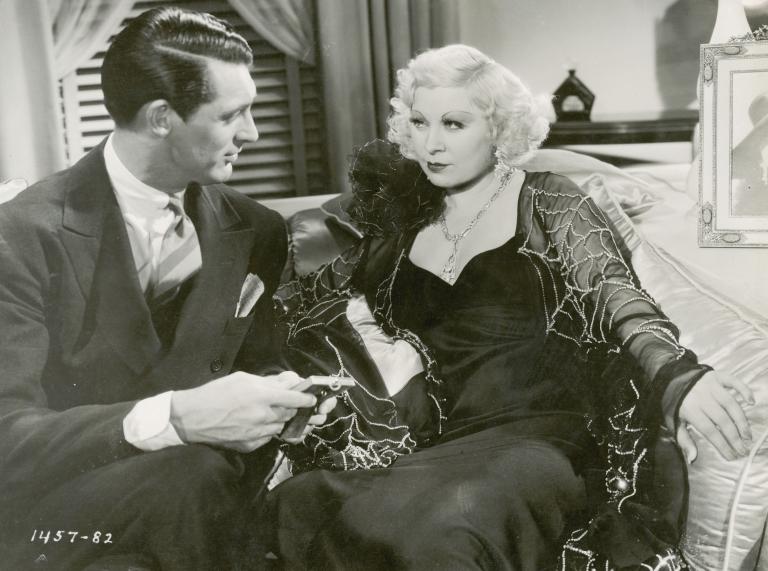 Cary Grant and Mae West exchange a look in a still from the film I'm No Angel, 1933.