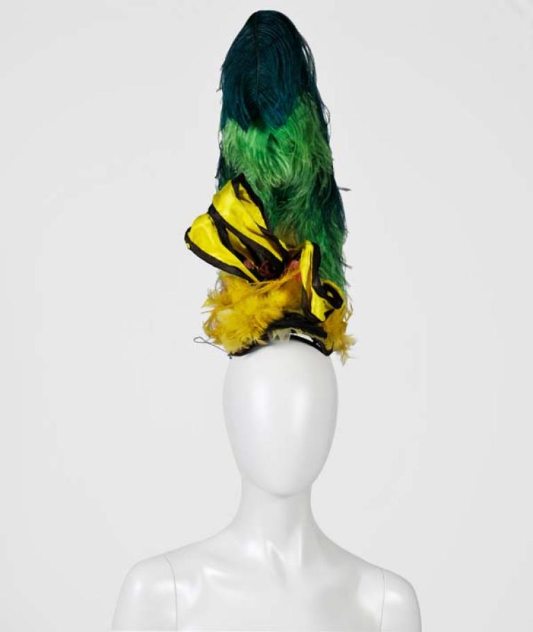 Green and yellow feathered headpiece from 'The Adventures of Priscilla, Queen of the Desert'. 