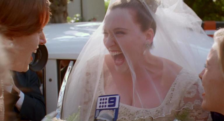Muriel (Toni Collette) looking ecstatic at her wedding