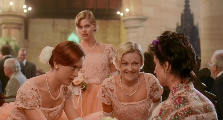 Bridesmaids talking to Rhonda (Rachel Griffiths) in her wheelchair