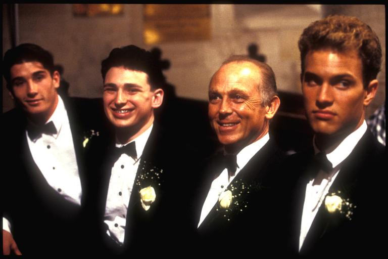David (Daniel Lapaine) looking glum with his groomsmen