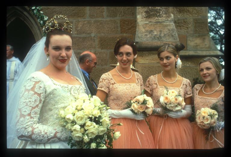 Muriel (Toni Collette) and bridesmaids Tania (Sophie Lee), Cheryl (Rosalind Hammond) and Janine (Belinda Jarrett)