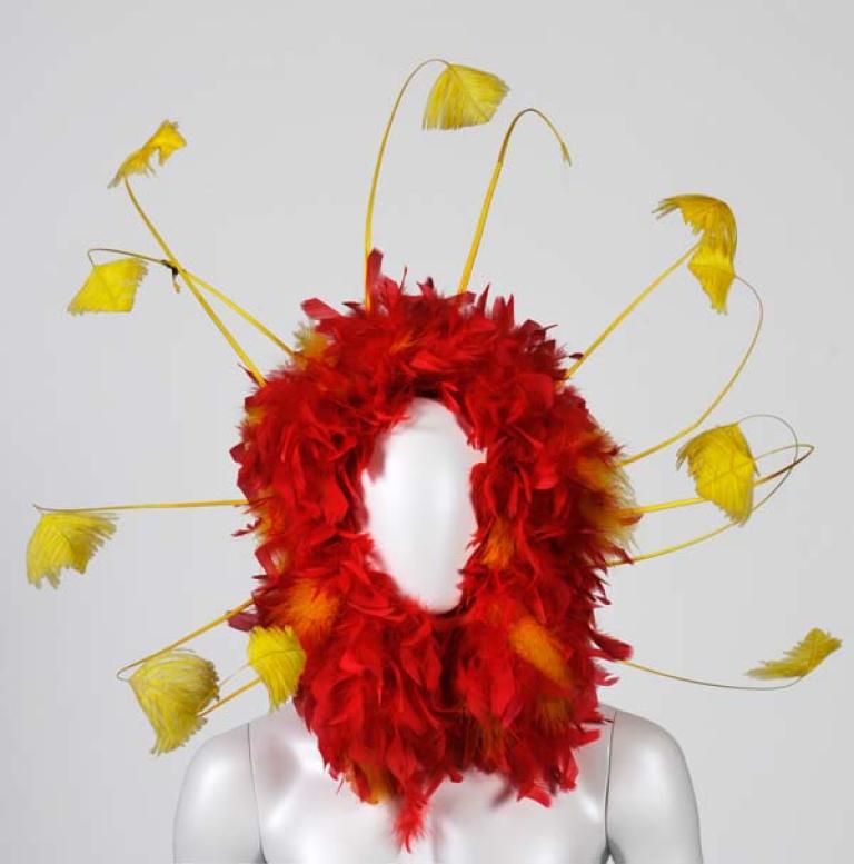 Red and yellow feathered headpiece from 'The Adventures of Priscilla, Queen of the Desert'.