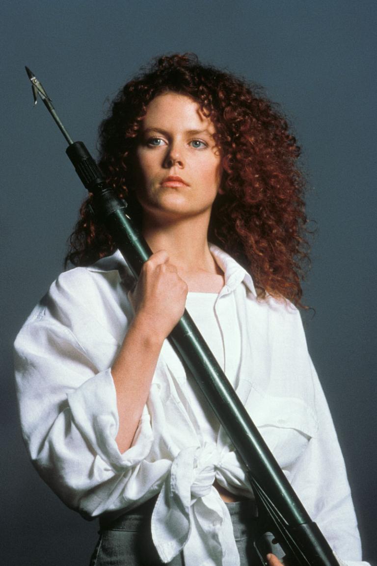 Nicole Kidman as Rae Ingram holding a spear gun.