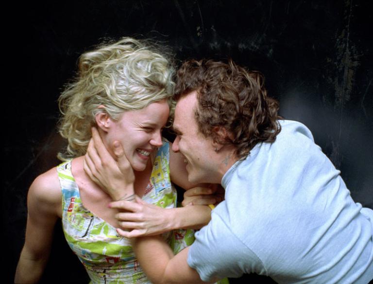 Abbie Cornish as Candy and Heath Ledger as Dan smiling at each other and in an embrace.