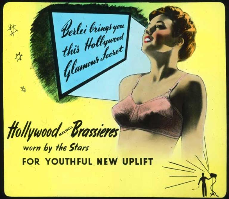 A woman is pictured in a bra with writing next to her saying 'Berlei brings you this Hollywood Glamour Secret. Hollywood Maxwell Brasieres worn by the starts for youthful, new uplift'.