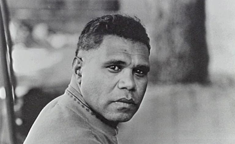 A black and white portrait of Archie Roach.