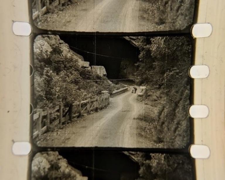 Film strip from a home movie showing the road to the Jenolan Caves.