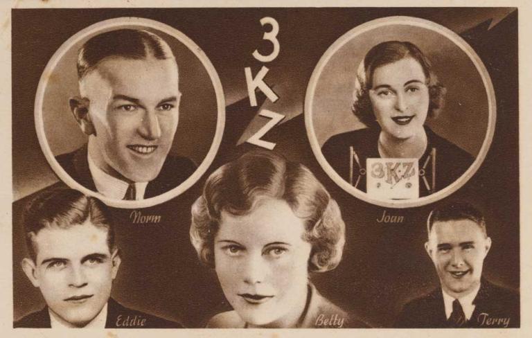 Postcard featuring the faces of five people, 3 men and 2 women. In the centre is the name of the radio station 3KZ.