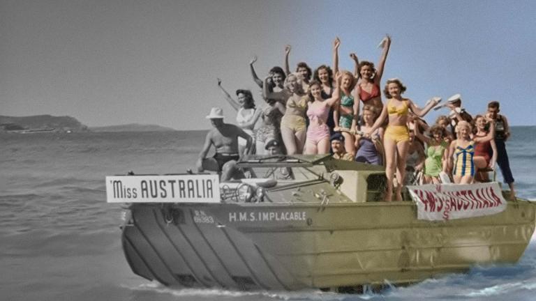 A partially colourised image of Miss Australia contestants in a boat