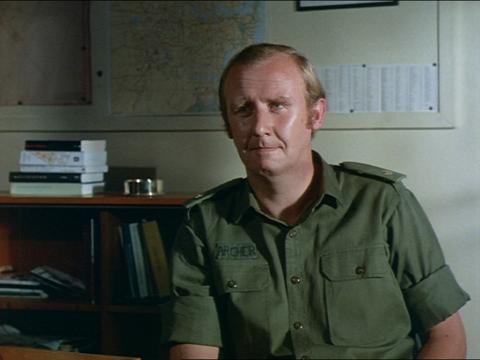 Bill Hunter, in military uniform, in the film One Good Reason