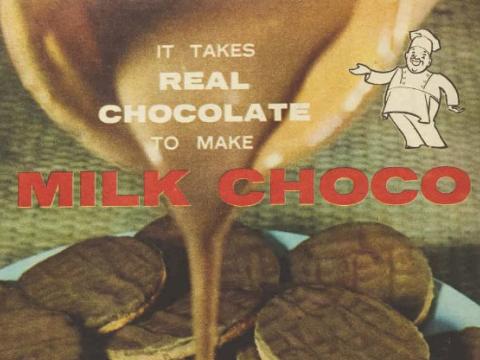 Advertisement showing chocolate pouring onto biscuits.