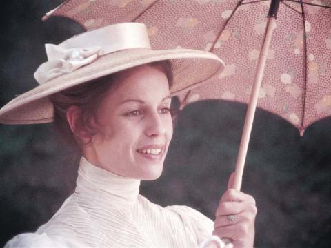 Mademoiselle de Poitiers (Helen Morse) with umbrella