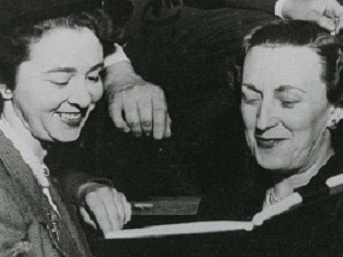 Glenda Raymond and Dorothy Crawford look over a script.