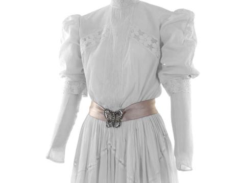 Detail of white muslin dress with butterfly sash worn by Miranda in the film Picnic at Hanging Rock