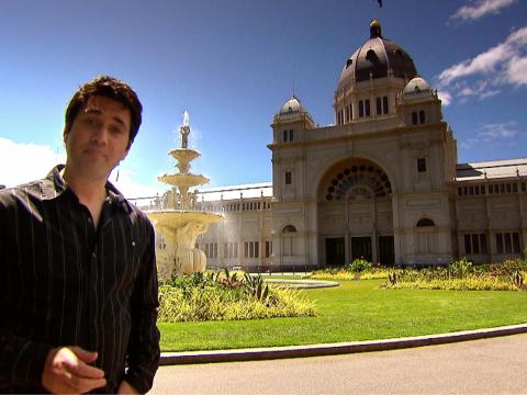 Man standing outside the Royal Exhibition Building.