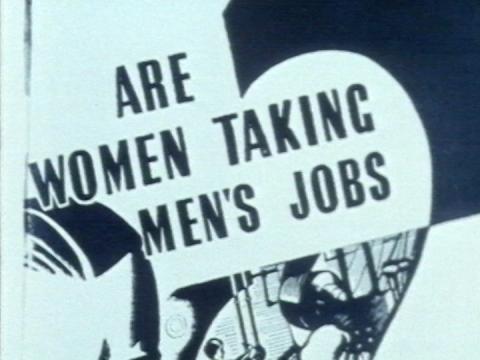 A sign saying 'Are women taking men's jobs'