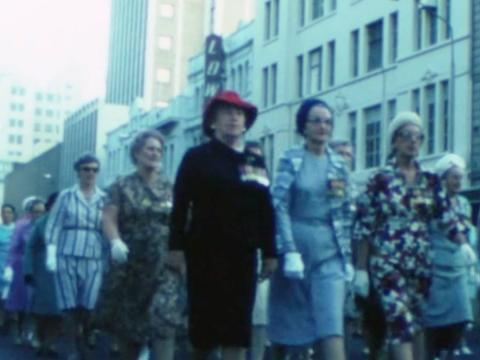 Women marching in formation during a 1977 Anzac Day parade