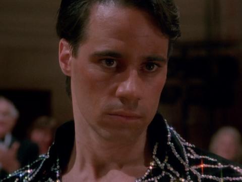Close up head and shoulders shot of Paul Mercurio as Scott Hastings in the 1992 film Strictly Ballroom. 