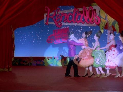 A group of dancers in a flashback scene from the film Strictly Ballroom