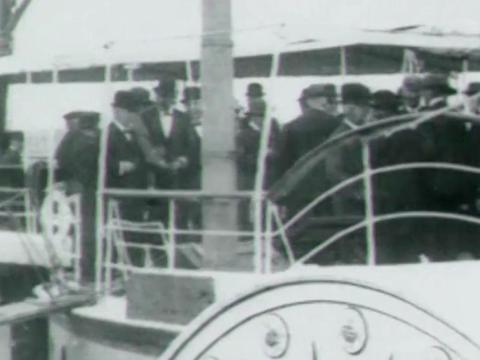 Queensland politicians on board the paddle steamer Lucinda, moored at a wharf on the Brisbane River in 1899.