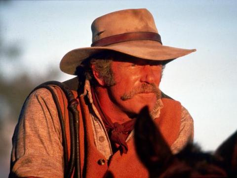 Close up of Jack Thompson as Clancy sitting on a horse